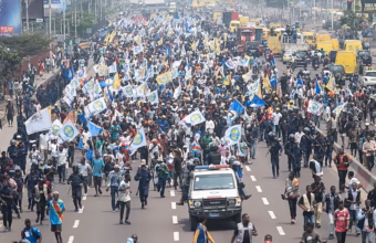 Police disperse protesters during an anti-government rally in Kinshasa