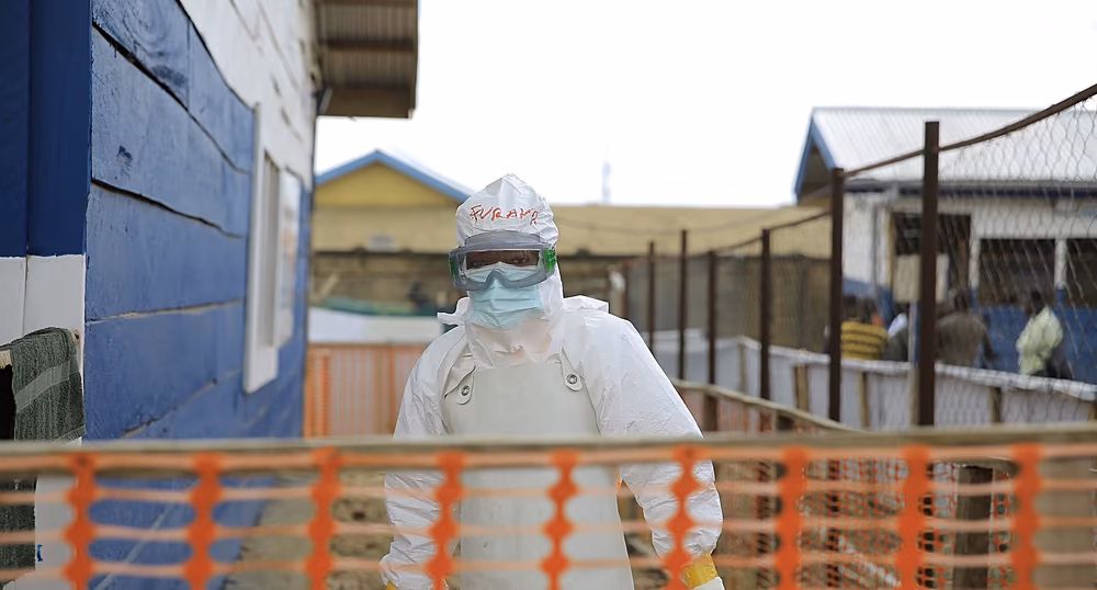 Health workers at an Ebola treatment facility in eastern Congo