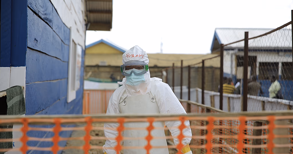 Health workers at an Ebola treatment facility in eastern Congo