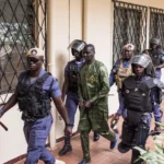 Sanna Manjang appears before a military court in Banjul in a desertion case