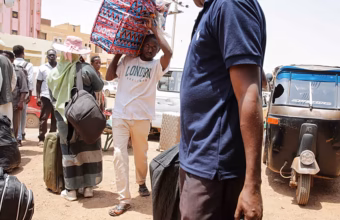 Sudanese refugees arriving at a transit centre in eastern Chad