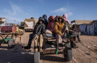 Sudanese refugees arriving at a transit centre in eastern Chad
